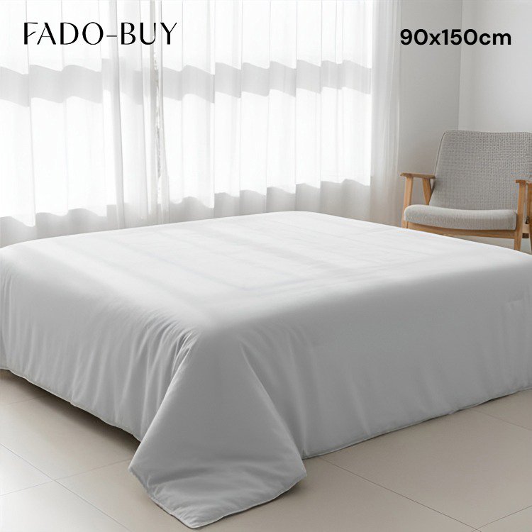 침대 위에 펼쳐진 포근한 코튼 이불