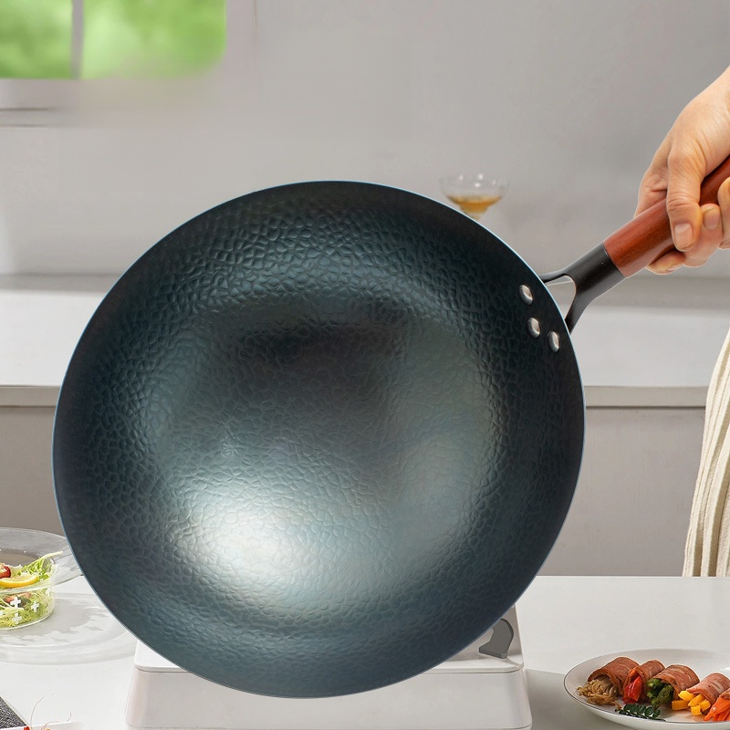 Uncoated round-bottomed iron wok