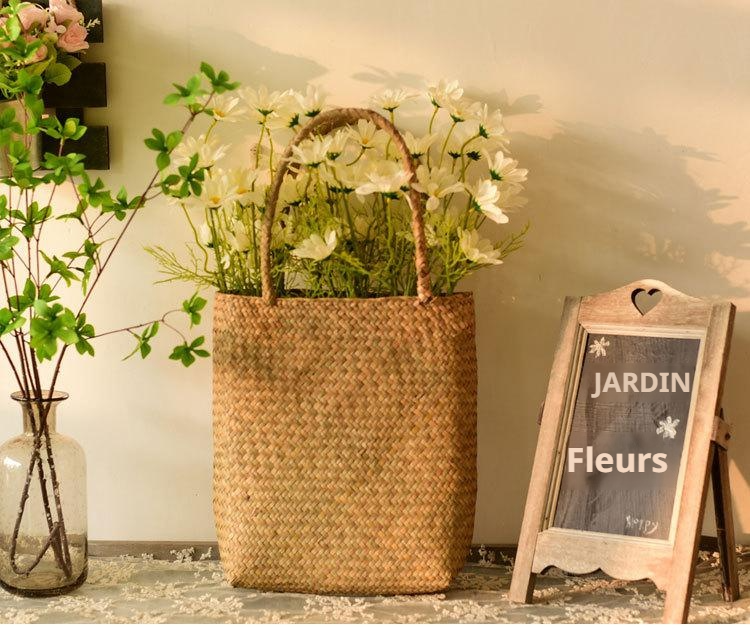 Panier à fleurs tressé en herbe de mer avec poignée