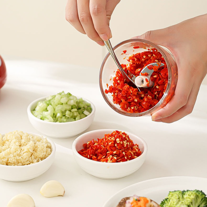 Portable electric garlic press