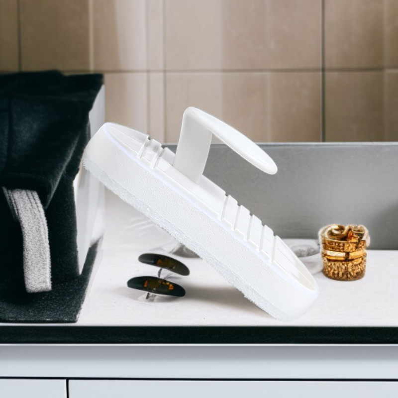 Multi-purpose brush cleaning dishes in the sink