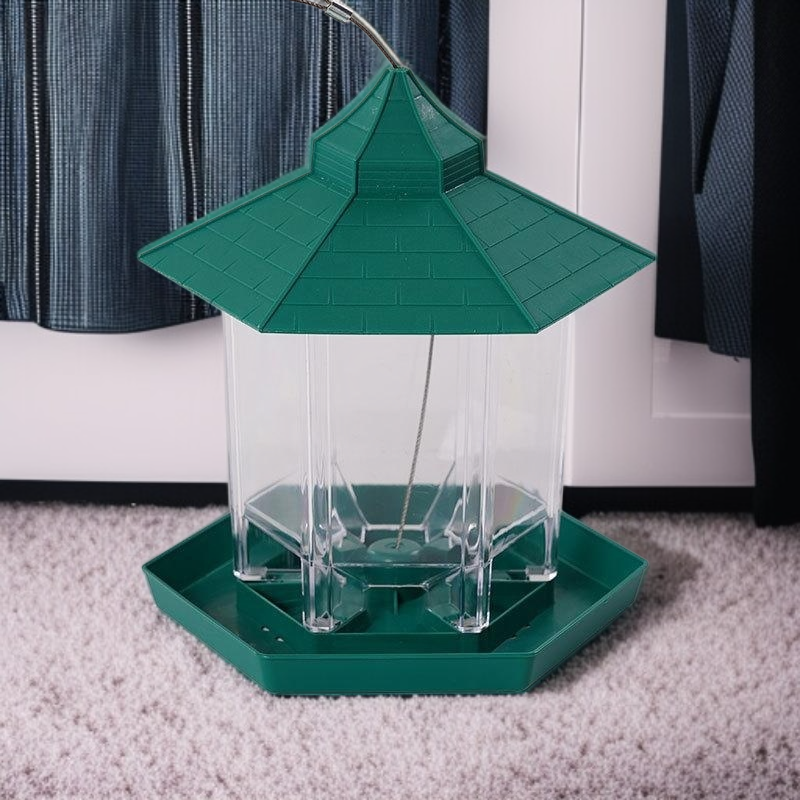 Green pavilion style bird feeder cage