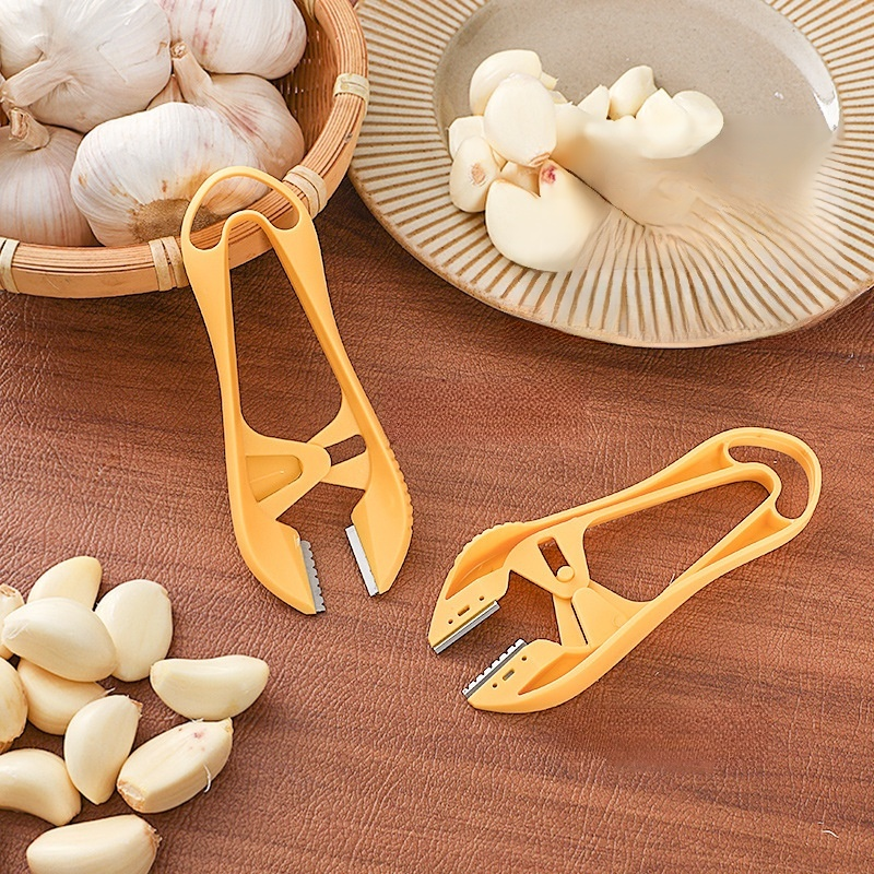 Stainless steel garlic peeler