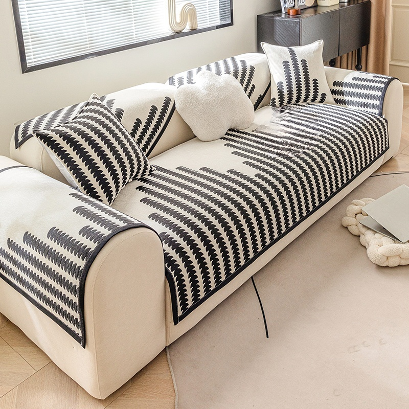 Universal anti-slip mat for sofa cushions