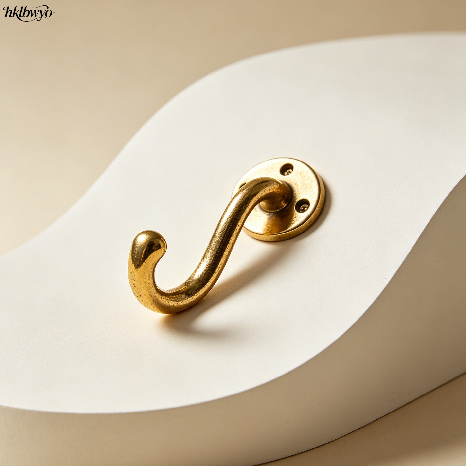 Durable brass hooks displayed on a white background
