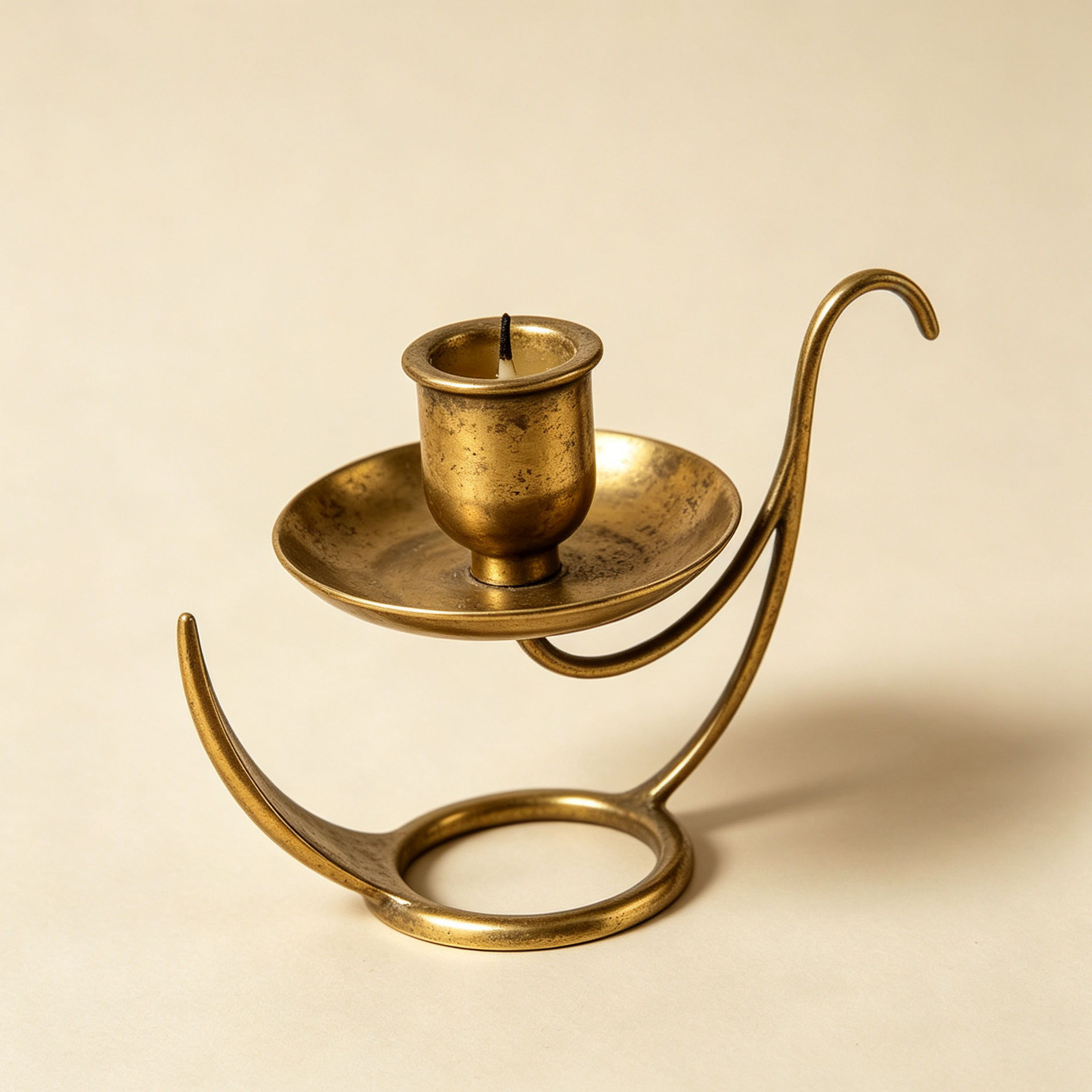 Close-up of antique brass candlestick with unique patina