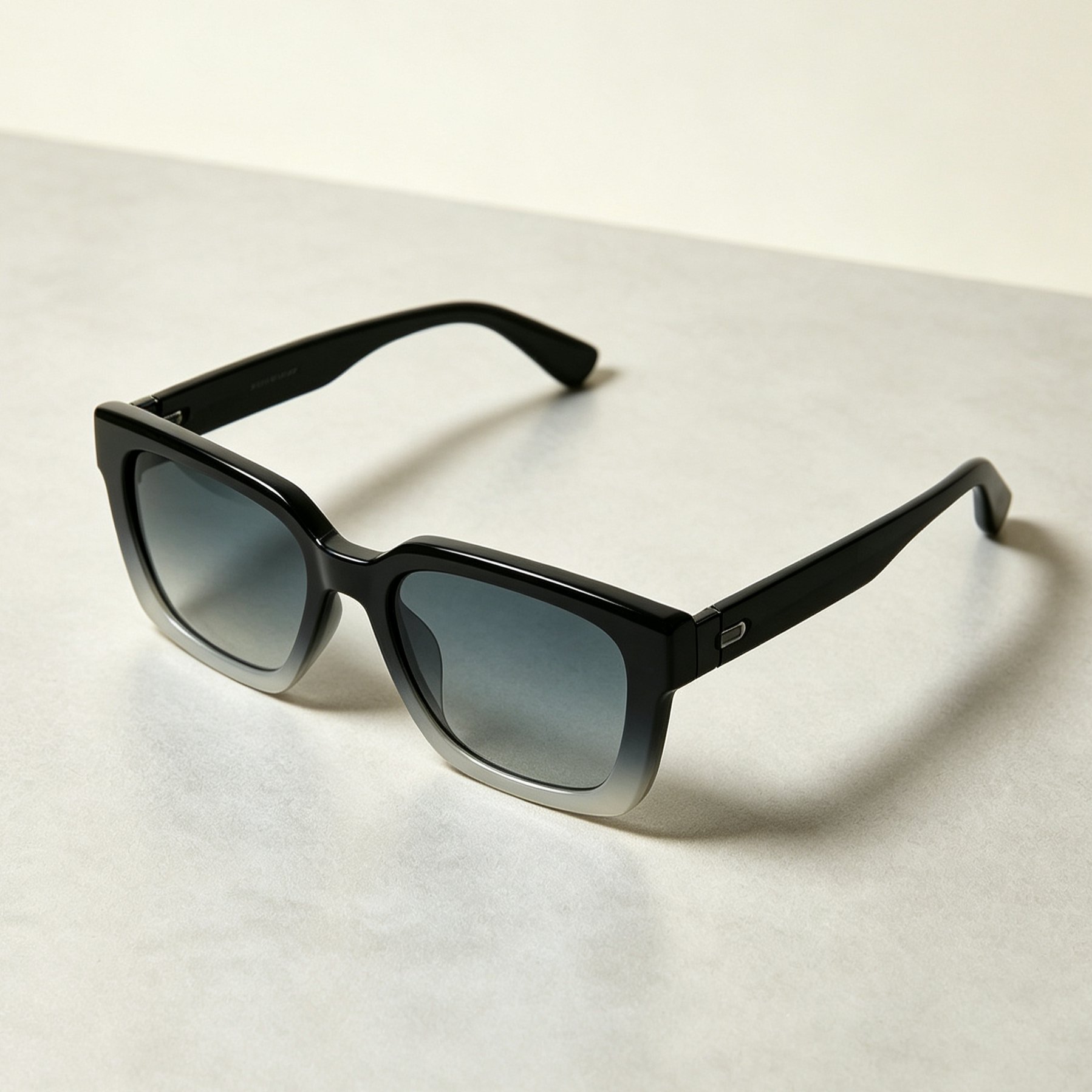 Side profile of oversized gradient sunglasses