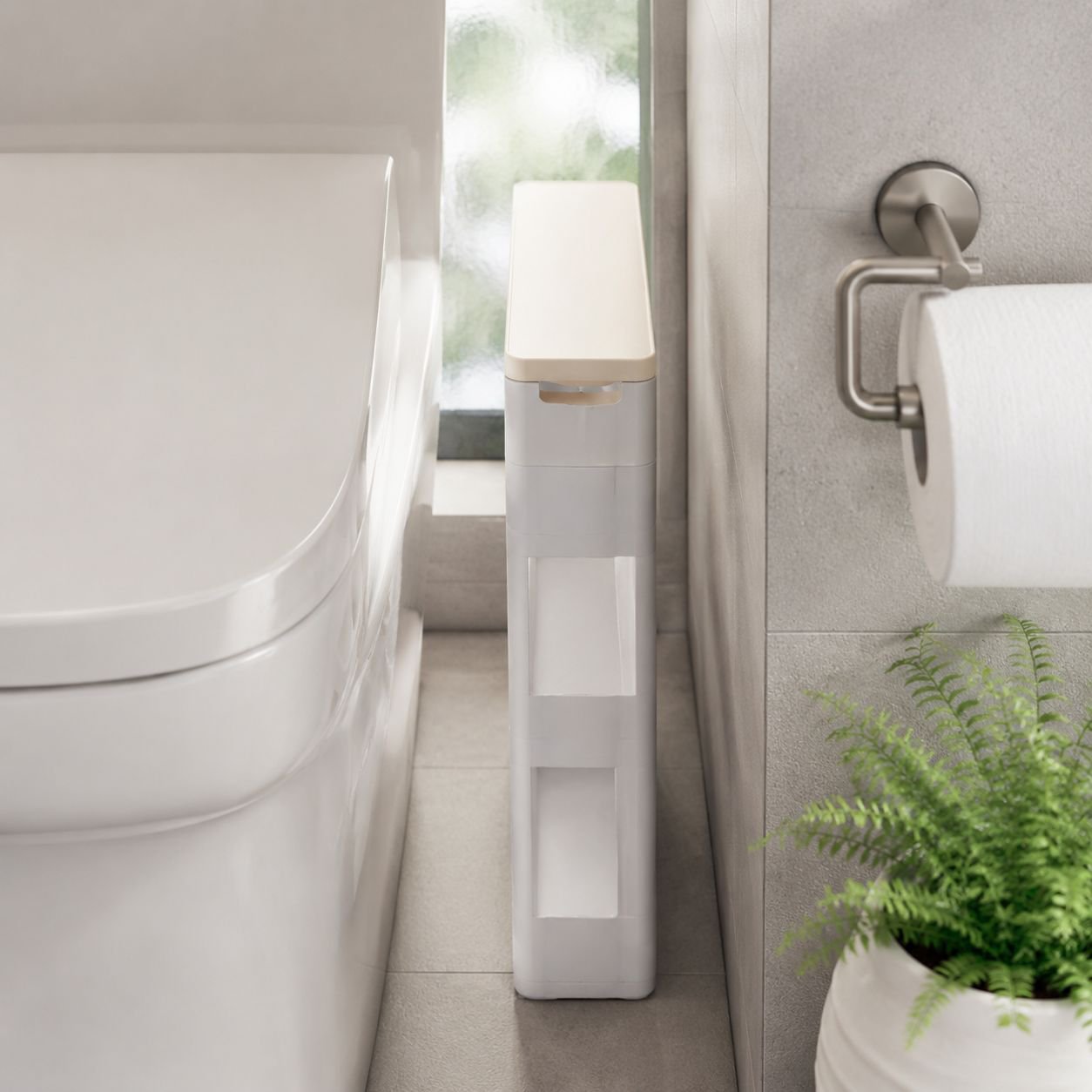 Multi-functional bathroom gap storage cabinet beside toilet