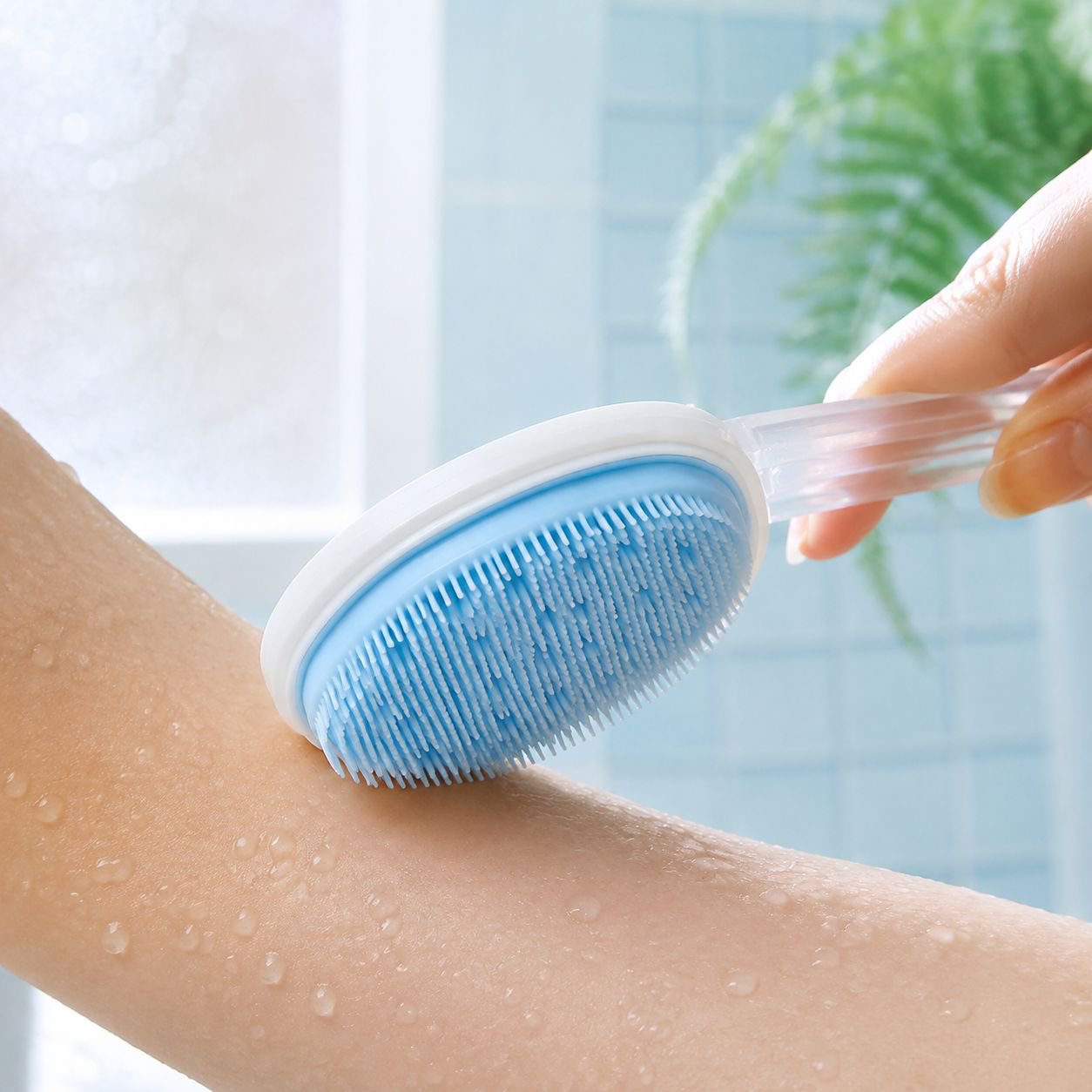 Multifunctional back scrubber with ergonomic handle