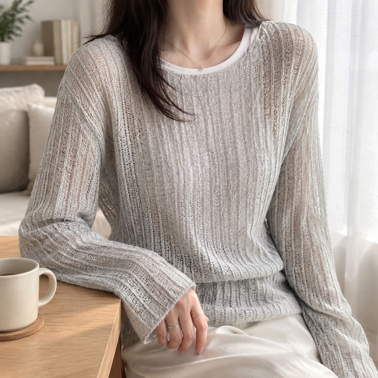 春秋用女性ルーズフィットパンチングカーディガン全体画像
