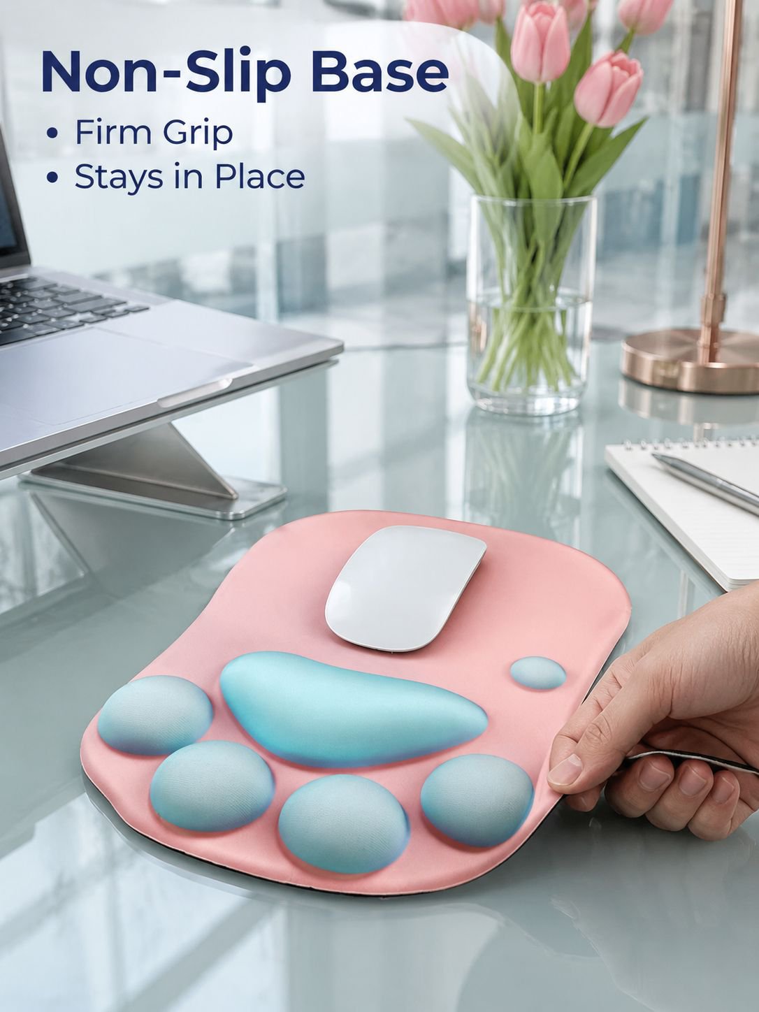 Cute and personalized silicone wrist rest mouse pad with cat paw design for computer laptops.