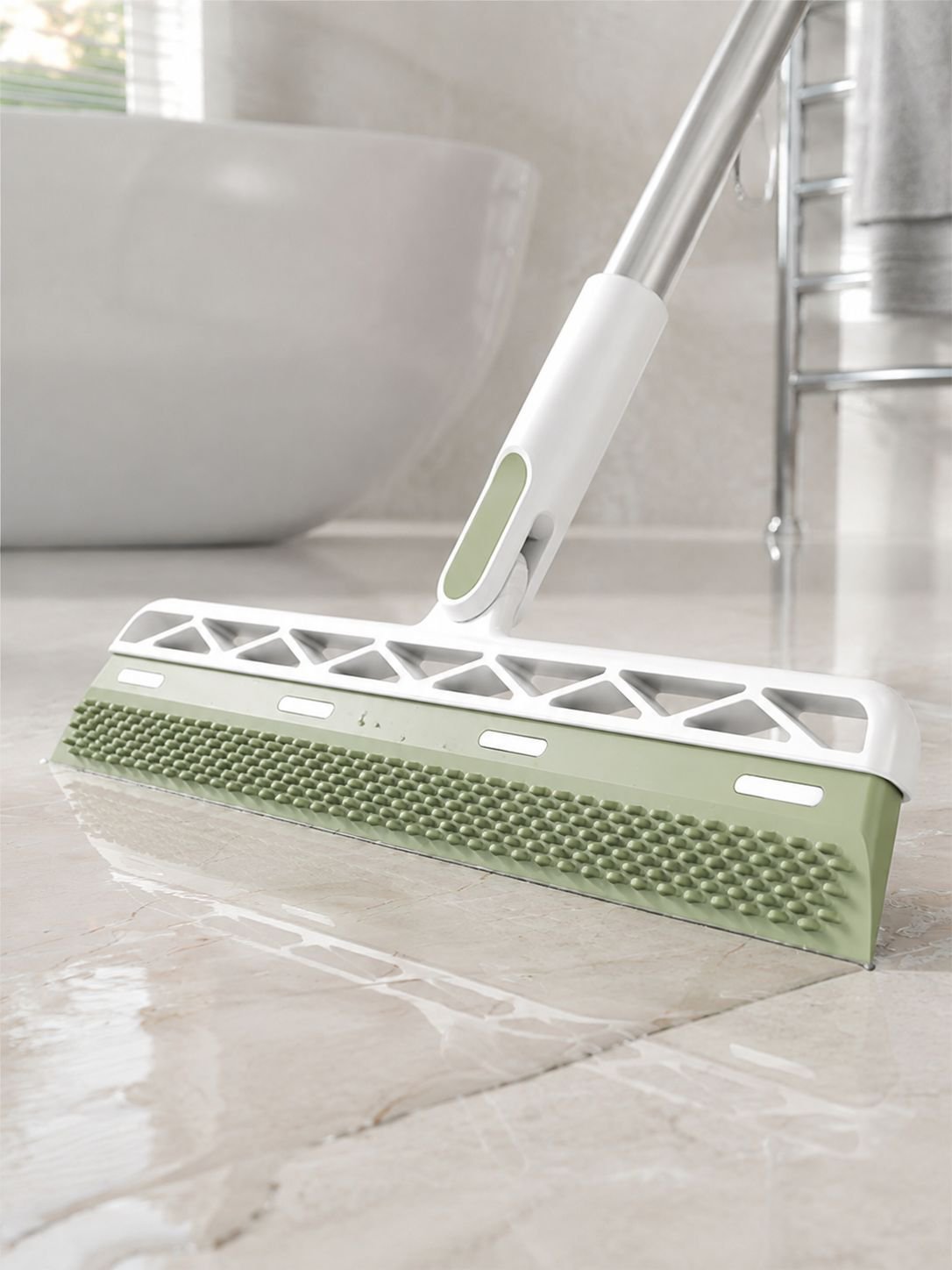 Close-up of the 5-in-1 functionality of the JMY cleaning broom