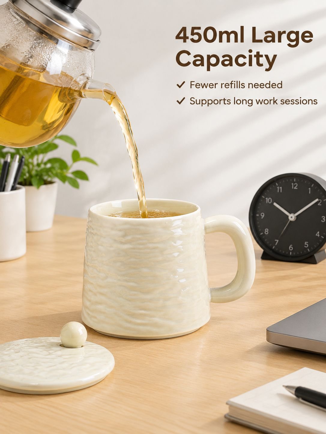 Large ceramic coffee mug with lid and spoon on a wooden table