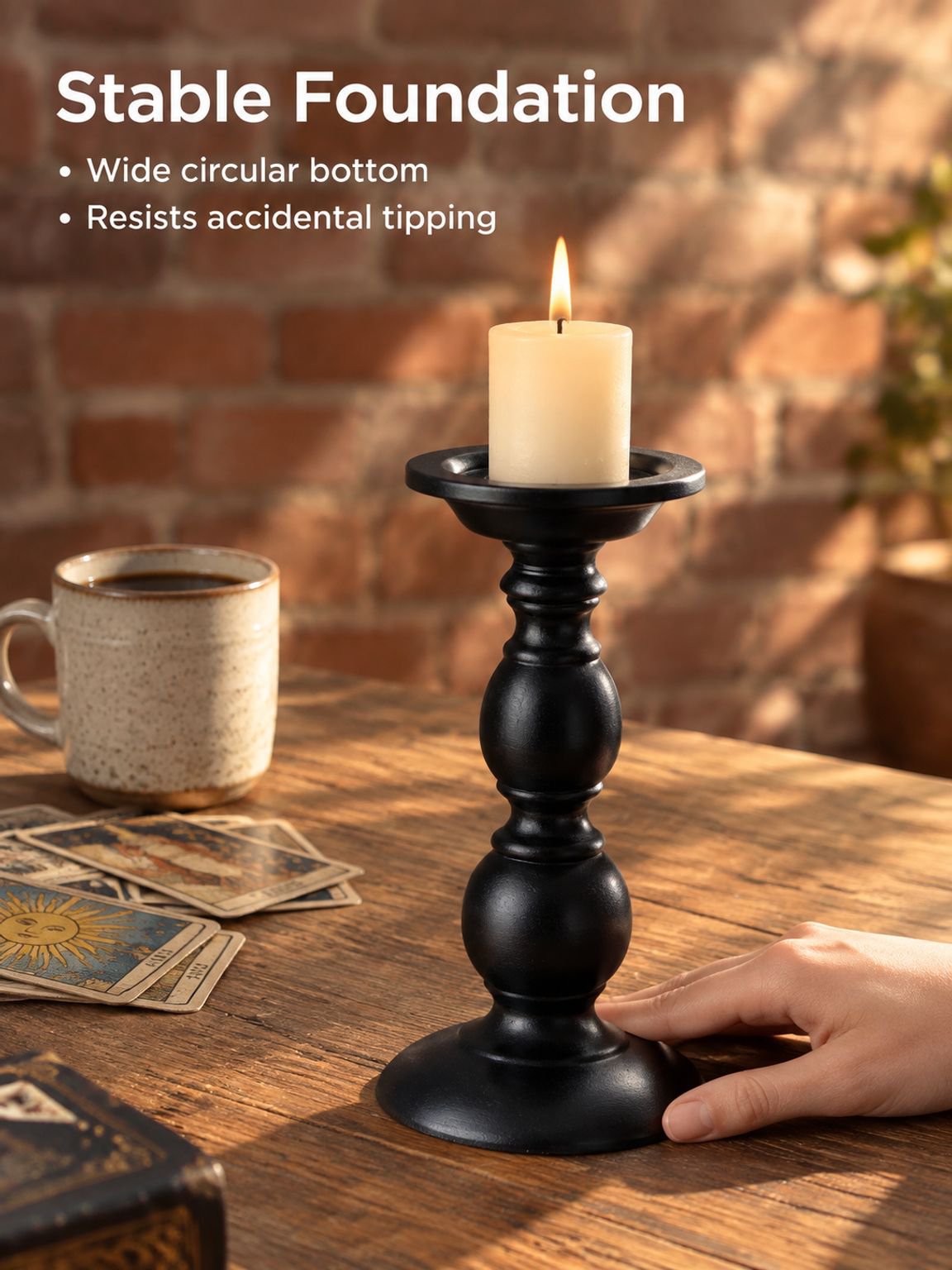 Roman-inspired pillar candle stand on a tabletop