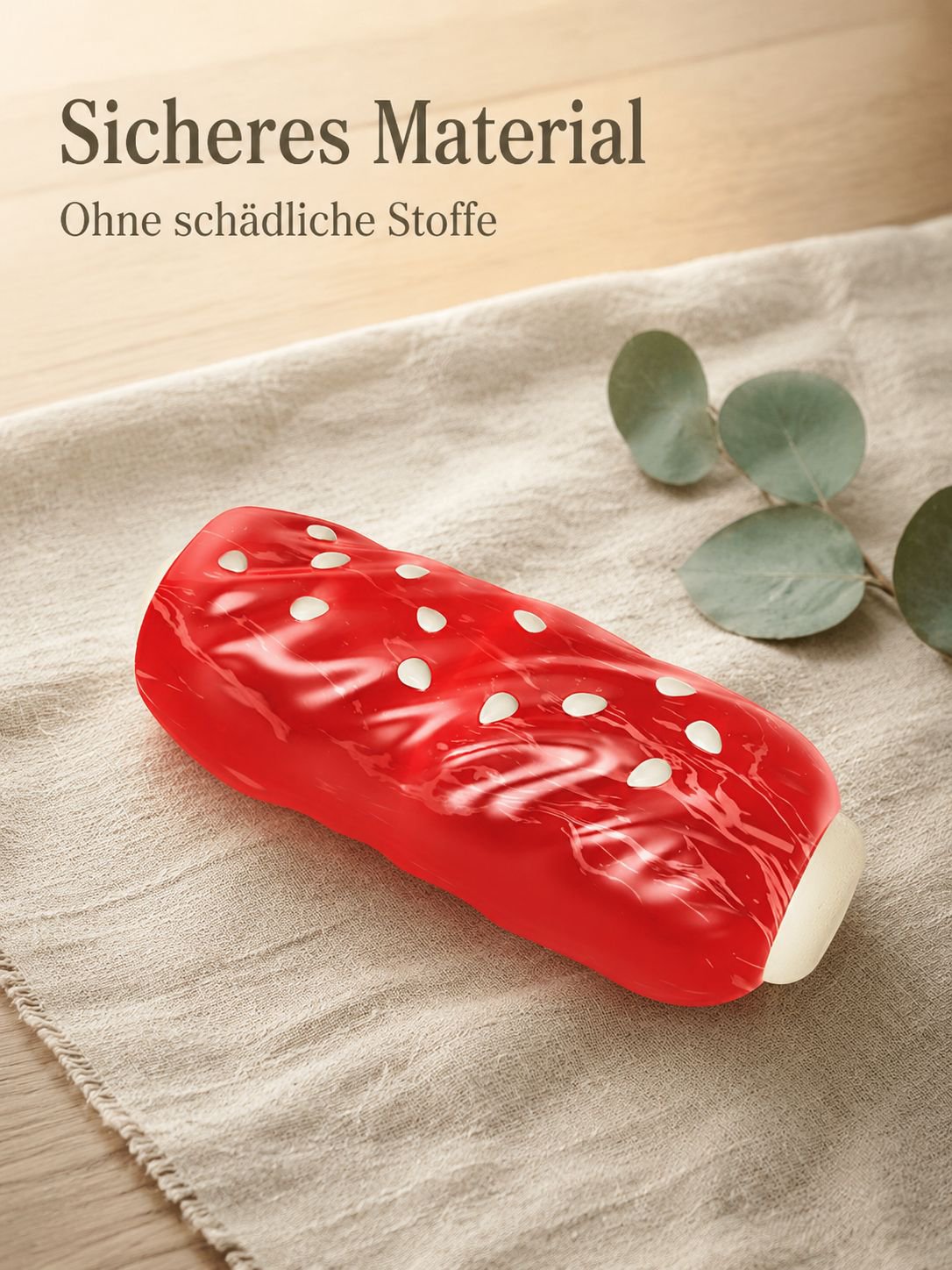 Hund kaut auf einem Hot Dog Beißring zur spielerischen Zahnpflege