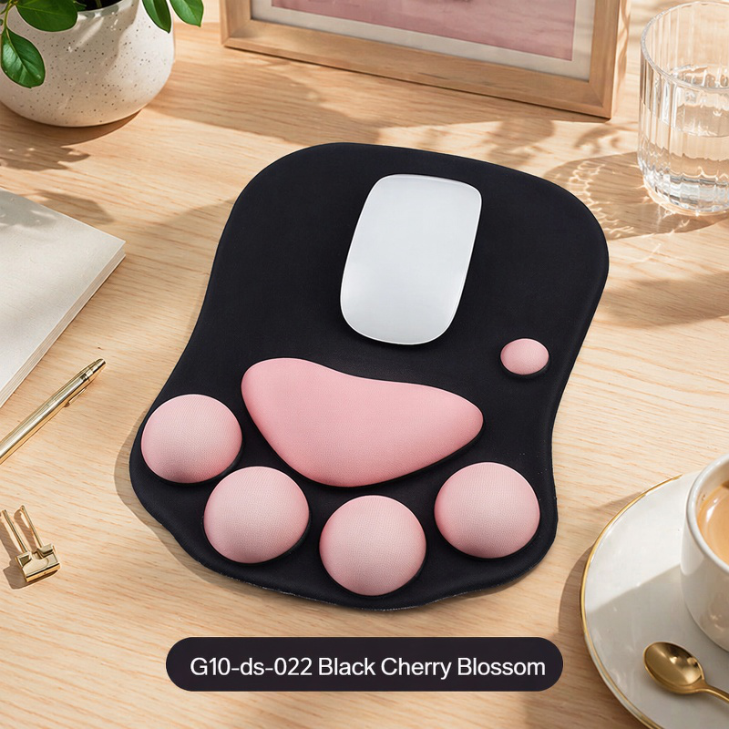 Cute and personalized silicone wrist rest mouse pad with cat paw design for computer laptops.