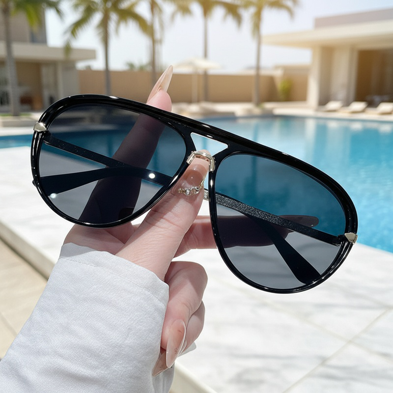 Close-up of stylish oversized aviator sunglasses frame
