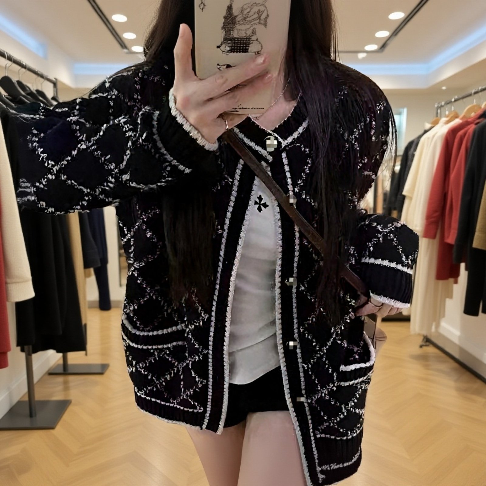 デザイン感のある女性用ニットカーディガン、ゆったりとした小衆スタイル