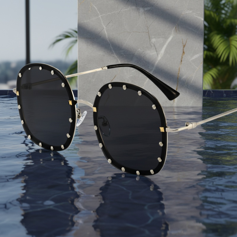 Lunettes de soleil rondes à rivets tendance unisexe vue de face