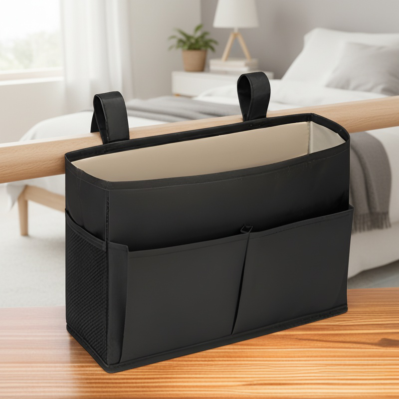 Bedside organizer bag attached to bed headboard