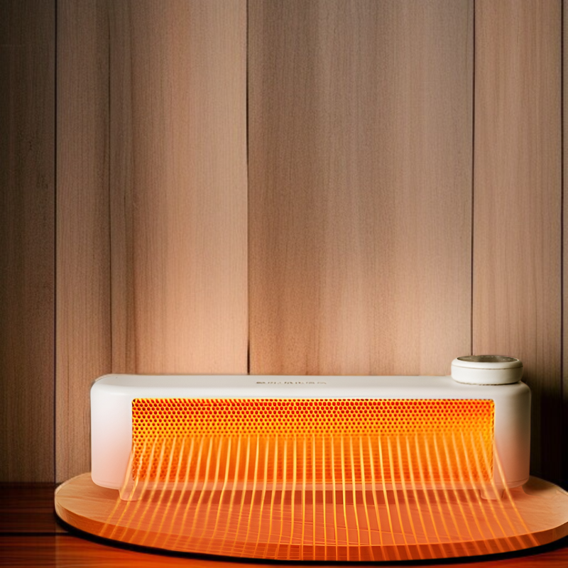 コンパクトサイズのヒーターを手に持つ様子