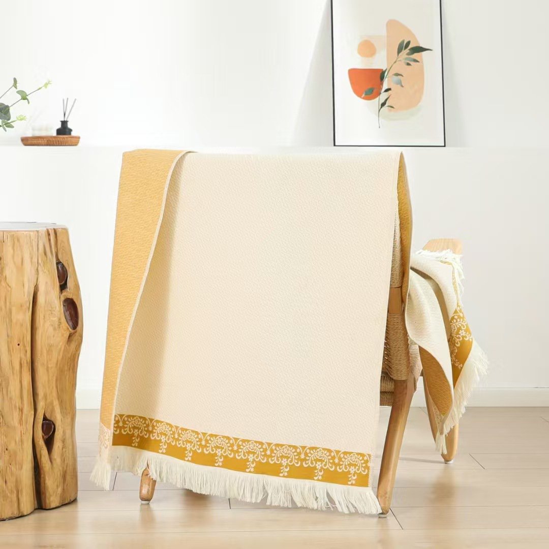 Serviette de bain à pompons en gaze multicouche