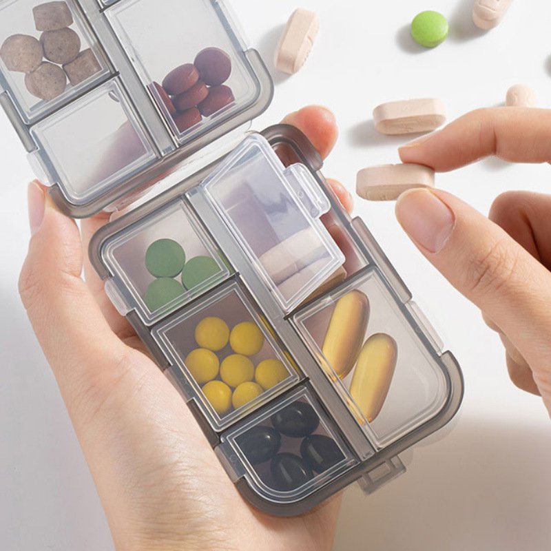 Portable transparent 10-compartment sealed pill box