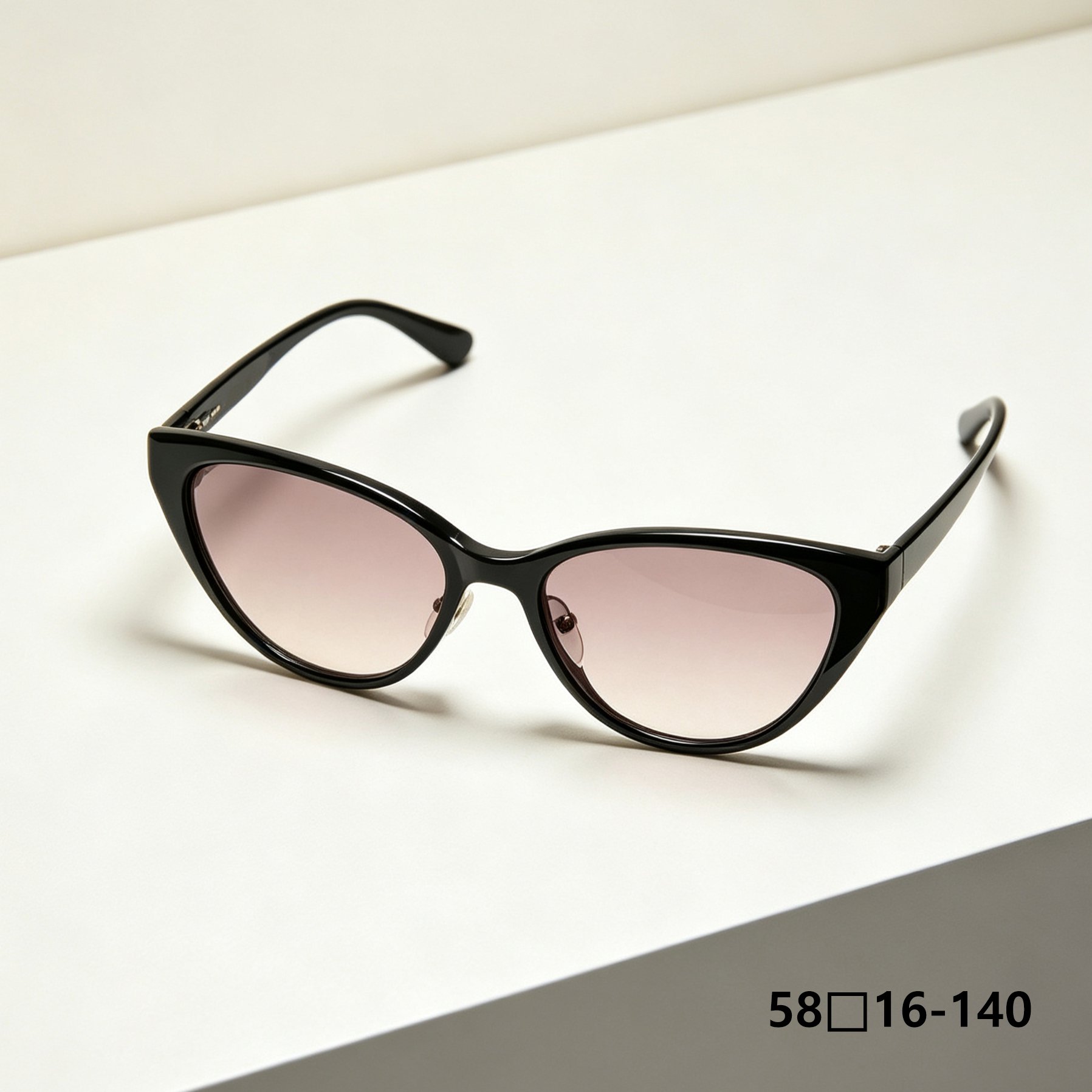 Trendy black cat eye sunglasses on a white background