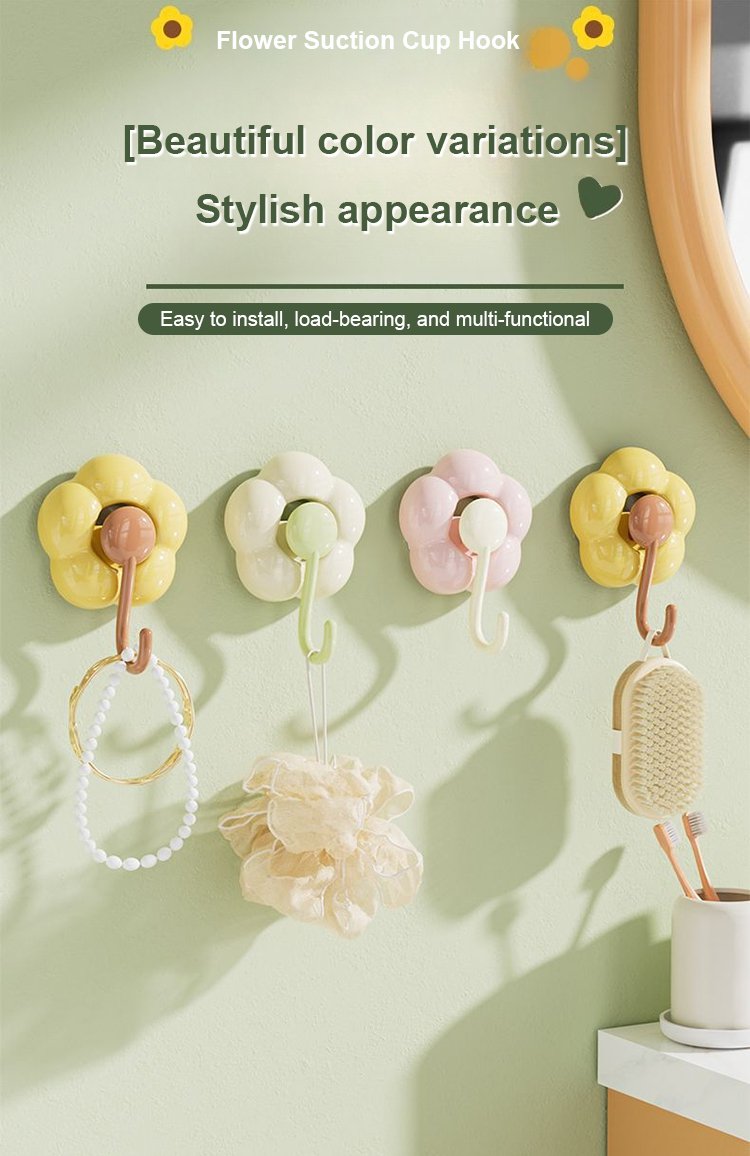 Strong load-bearing flower suction cup hook holding towel on bathroom wall