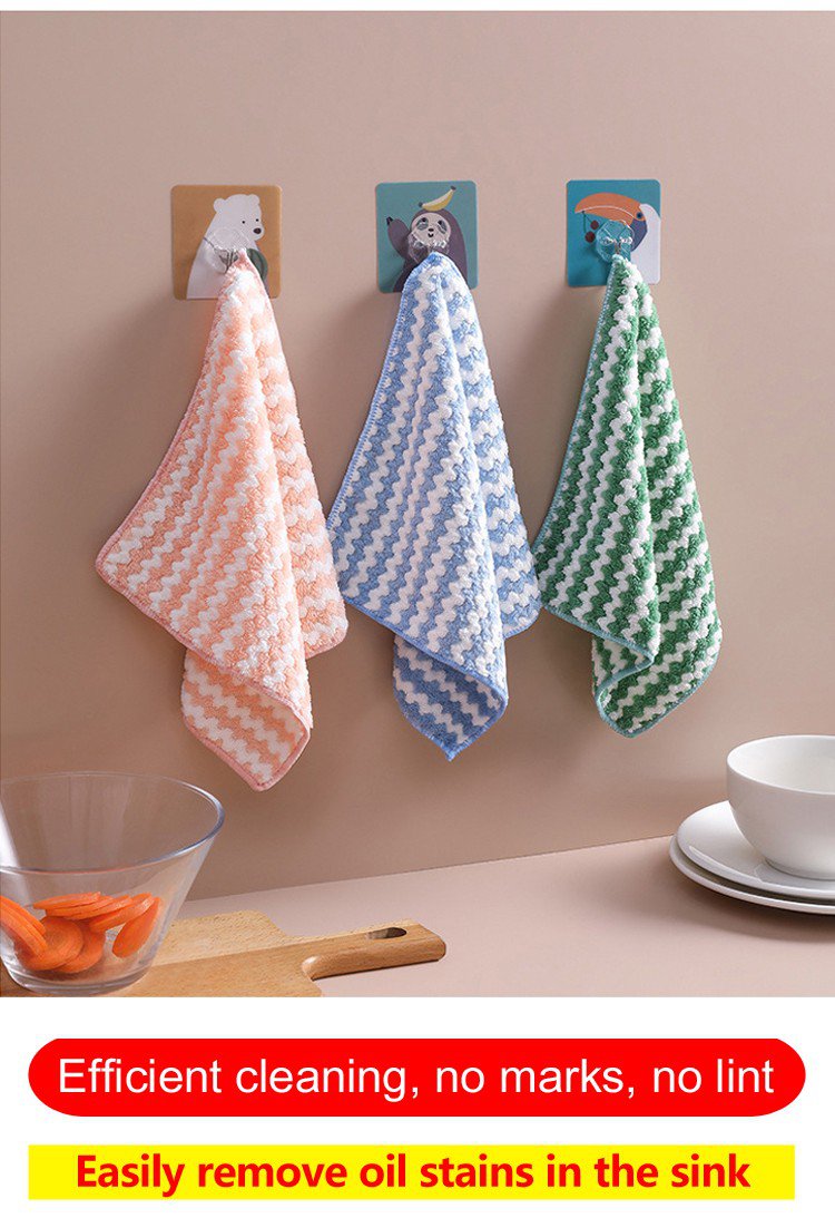 Close-up of Lazy Kitchen wipes absorbing liquid spill