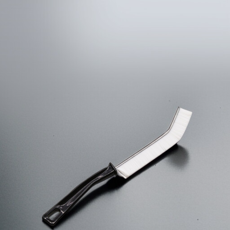 ロングブラシを使った家具下の掃除例