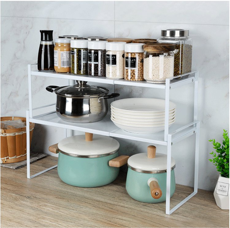 다양한 물품을 정리한 신축 가능한 거치대