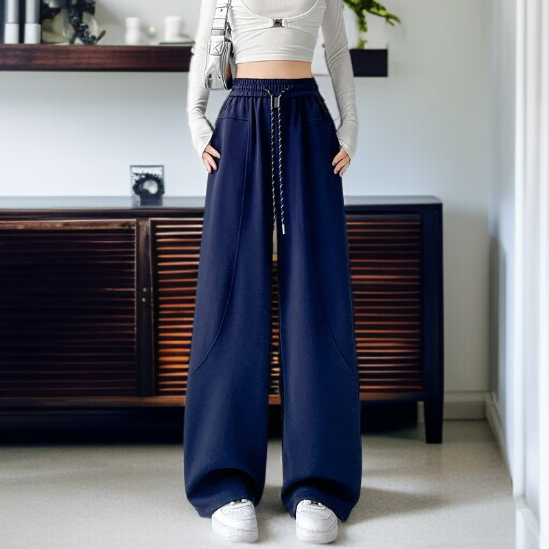 여성 맨투맨과 매치된 와이드 팬츠 코디